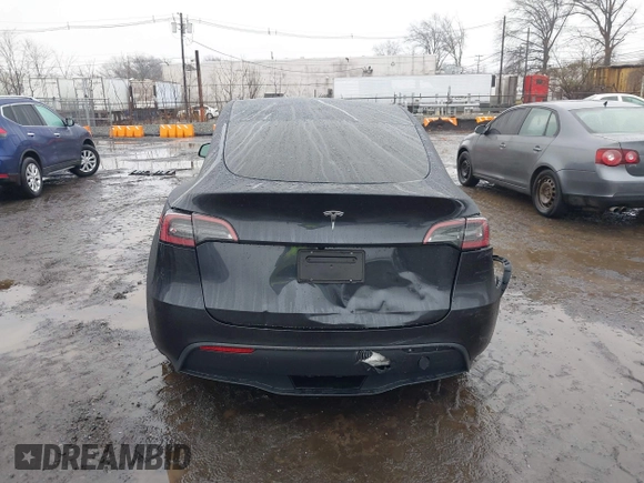 2025 Tesla Model Y Long Range with VIN 7SAYGDED6SF226035, listed as a IAAI auction lot 41102115 with Not Provided miles and . Bid and sale history available at DreamBid. Image 16.
