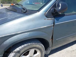 2005 Dodge Caravan SXT z VIN 2D4GP44L95R324232, wystawiony jako IAAI lot #42056320 z przebiegiem 200 459 mil mil oraz . Historia ofert i sprzedaży dostępna na DreamBid. Obrazek 6.