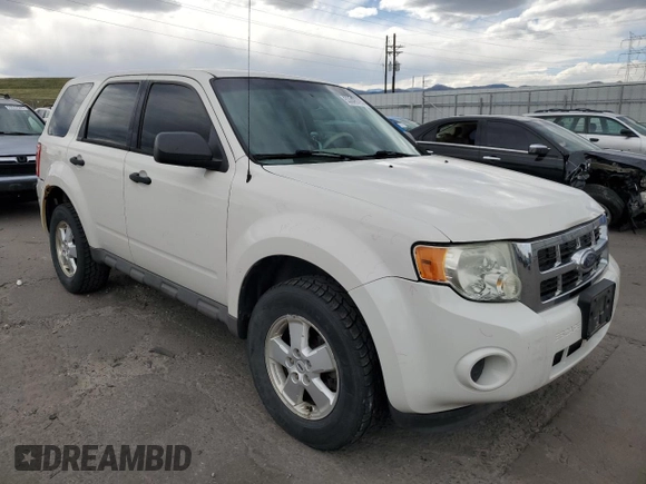 2009 Ford Escape XLS with VIN 1FMCU92749KB31140, listed as a Copart auction lot 53645705 with 213,481 mi miles and Salvage title. Bid and sale history available at DreamBid. Image 4.