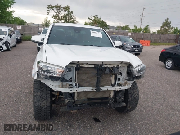 2020 Toyota Tacoma SR5 z VIN 5TFCZ5AN5LX242708, wystawiony jako IAAI lot #42356772 z przebiegiem 65 442 mil mil oraz . Historia ofert i sprzedaży dostępna na DreamBid. Obrazek 12.