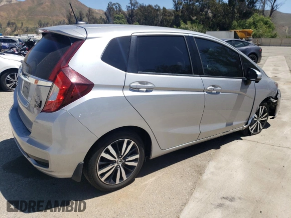 2018 Honda Fit EX with VIN 3HGGK5H88JM719092, listed as a Copart auction lot 61271925 with 86,516 mi miles and Salvage title. Bid and sale history available at DreamBid. Image 3.