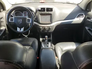 2013 Dodge Journey Crew with VIN 3C4PDCDG5DT668803, listed as a Copart auction lot 61931035 with 121,173 mi miles and Salvage title. Bid and sale history available at DreamBid. Image 8.