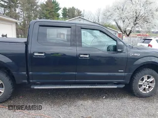 2015 Ford F-150 XLT with VIN 1FTEW1EPXFFC20641, listed as a IAAI auction lot 41945749 with 120,229 mi miles and . Bid and sale history available at DreamBid. Image 14.