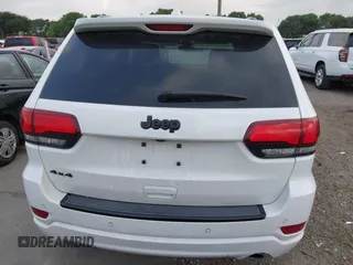 2017 Jeep Grand Cherokee Altitude z VIN 1C4RJFAG3HC707171, wystawiony jako IAAI lot #42145431 z przebiegiem 82 199 mil mil oraz . Historia ofert i sprzedaży dostępna na DreamBid. Obrazek 17.