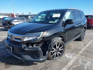2022 Honda Pilot Touring 7-Passenger with VIN 5FNYF6H63NB006591, listed as a IAAI auction lot 41471359 with 75,574 mi miles. Bid and sale history available at carsss.com. Image 6.
