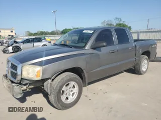 2006 Dodge Dakota SLT z VIN 1D7HW48K36S534241, wystawiony jako Copart lot #52643745 z przebiegiem 208 853 mil mil oraz Szkoda całkowita • Salvage title. Historia ofert i sprzedaży dostępna na DreamBid. Obrazek 1.