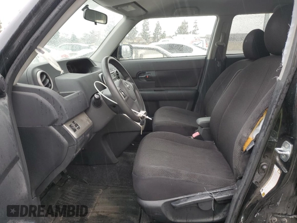 2009 Scion xB with VIN JTLKE50EX91071110, listed as a Copart auction lot 48939845 with 163,798 mi miles and Salvage Title. Bid and sale history available at DreamBid. Image 7.