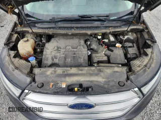 2015 Ford Edge SE z VIN 2FMTK3G85FBB63721, wystawiony jako Copart lot #61476615 z przebiegiem 145 026 mil mil oraz Szkoda całkowita • Salvage title. Historia ofert i sprzedaży dostępna na DreamBid. Obrazek 11.