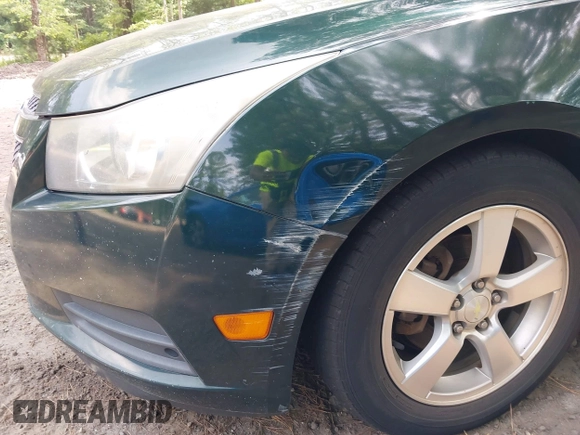 2014 Chevrolet Cruze 1LT with VIN 1G1PC5SB9E7156806, listed as a IAAI auction lot 42813826 with 140,573 mi miles and . Bid and sale history available at DreamBid. Image 13.