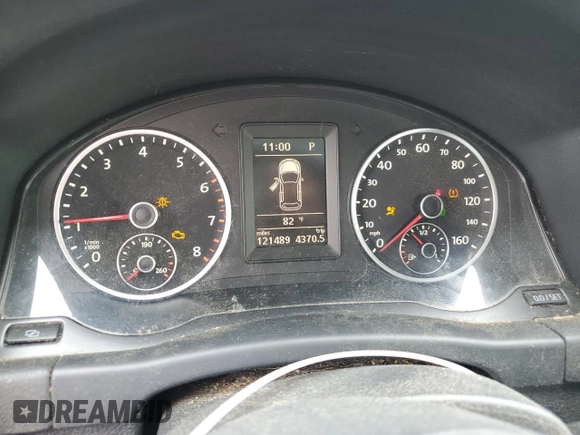 2012 Volkswagen Tiguan S with VIN WVGAV7AX0CW546403, listed as a Copart auction lot 65477915 with 121,489 mi miles and Salvage title. Bid and sale history available at DreamBid. Image 9.