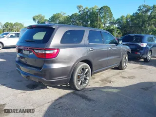 2014 Dodge Durango SXT with VIN 1C4RDHAGXEC345032, listed as a IAAI auction lot 37126149 with 118,001 mi miles. Bid and sale history available at carsss.com. Image 4.