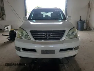 2006 Lexus GX 470 z VIN JTJBT20X060110741, wystawiony jako Copart lot #56944755 z przebiegiem 234 412 mil mil oraz Tytuł czysty. Historia ofert i sprzedaży dostępna na DreamBid. Obrazek 5.