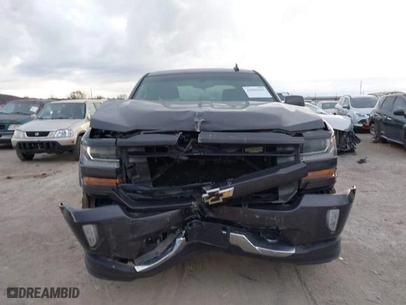 2016 Chevrolet Silverado 1500 LT with VIN 3GCUKREC0GG252047, listed as a IAAI auction lot 41004266 with 170,817 mi miles. Bid and sale history available at carsss.com. Image 6.