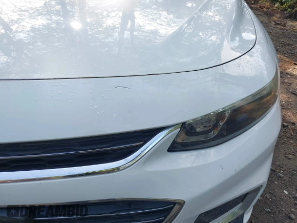 2016 Chevrolet Malibu LS z VIN 1G1ZB5STXGF254708, wystawiony jako IAAI lot #42429173 z przebiegiem 148 944 mil mil oraz . Historia ofert i sprzedaży dostępna na DreamBid. Obrazek 17.