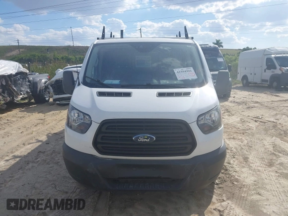 2019 Ford Transit z VIN 1FTYR2YM5KKA41176, wystawiony jako IAAI lot #41594906 z przebiegiem 76 637 mil mil oraz . Historia ofert i sprzedaży dostępna na DreamBid. Obrazek 13.