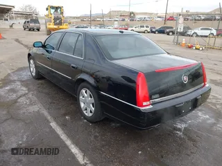 2006 Cadillac DTS w/1SC with VIN 1G6KD57Y96U251691, listed as a IAAI auction lot 41086147 with 128,959 mi miles. Bid and sale history available at carsss.com. Image 3.