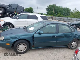 1996 Ford Taurus LX with VIN 1FALP53S3TG177324, listed as a IAAI auction lot 42622520 with 126,979 mi miles and . Bid and sale history available at DreamBid. Image 14.