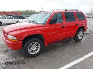 2000 Dodge Durango with VIN 1B4HS28Z4YF259625, listed as a IAAI auction lot 41943023 with 265,275 mi miles and . Bid and sale history available at DreamBid. Image 2.