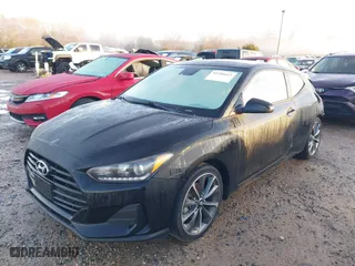 2019 Hyundai Veloster 2.0 Premium with VIN KMHTG6AF3KU013055, listed as a IAAI auction lot 41206611 with 48,759 mi miles. Bid and sale history available at carsss.com. Image 2.