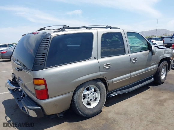 2001 Chevrolet Tahoe LS with VIN 1GNEK13TX1R192382, listed as a IAAI auction lot 39976735 with 243,083 mi miles. Bid and sale history available at carsss.com. Image 4.