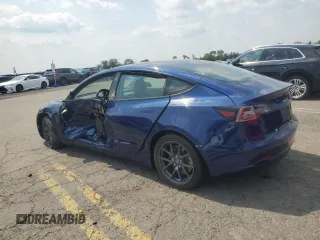 2021 Tesla Model 3 Long Range z VIN 5YJ3E1EB5MF853256, wystawiony jako Copart lot #60751685 z przebiegiem 58 959 mil mil oraz Szkoda całkowita • Salvage title. Historia ofert i sprzedaży dostępna na DreamBid. Obrazek 2.