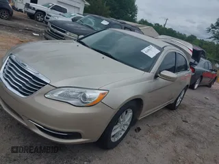 2014 Chrysler 200 Touring with VIN 1C3CCBBBXEN118019, listed as a IAAI auction lot 42154127 with 140,301 mi miles and . Bid and sale history available at carsss.com. Image 2.
