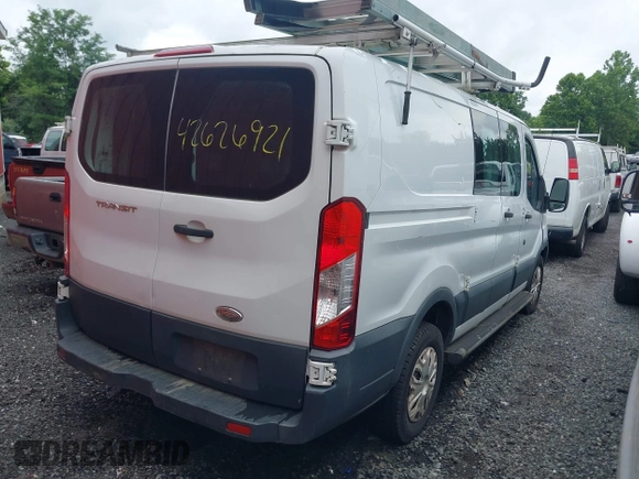 2015 Ford Transit Cargo with VIN 1FTNR1ZM8FKA34322, listed as a IAAI auction lot 42626921 with 162,924 mi miles and . Bid and sale history available at DreamBid. Image 4.