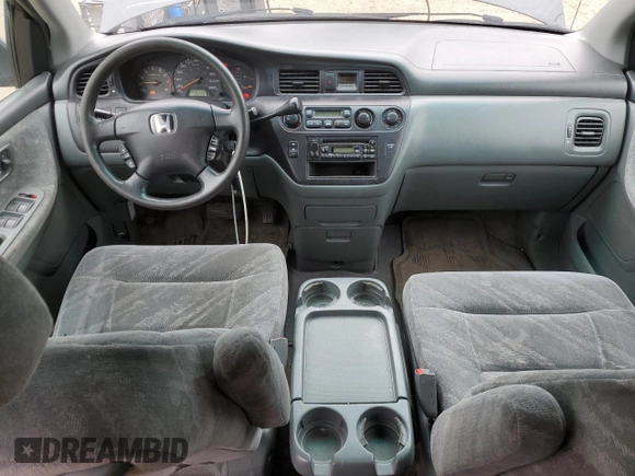 2003 Honda Odyssey EX with VIN 2HKRL18603H008412, listed as a Copart auction lot 87502365 with 352,773 mi miles and Salvage Title. Bid and sale history available at DreamBid. Image 8.