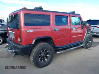 2003 Hummer H2 with VIN 5GRGN23U23H104200, listed as a IAAI auction lot 41687769 with 1 mi miles. Bid and sale history available at carsss.com. Image 4.