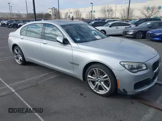 2015 BMW 7 Series 750Li with VIN WBAYE8C5XFD782039, listed as a IAAI auction lot 41505626 with 74,716 mi miles. Bid and sale history available at carsss.com. Image 1.