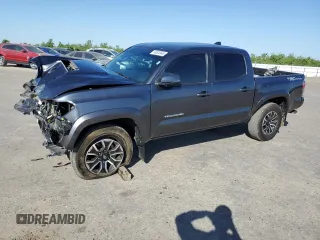 2022 Toyota Tacoma SR5 z VIN 3TMAZ5CNXNM195866, wystawiony jako Copart lot #56503945 z przebiegiem 18 332 mil mil oraz Szkoda całkowita • Salvage title. Historia ofert i sprzedaży dostępna na DreamBid. Obrazek 1.