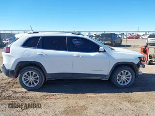 2019 Jeep Cherokee Latitude with VIN 1C4PJMCB2KD352024, listed as a IAAI auction lot 40868796 with 96,854 mi miles and . Bid and sale history available at DreamBid. Image 14.