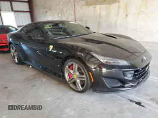 2019 Ferrari Portofino z VIN ZFF89FPA2K0239970, wystawiony jako Copart lot #74377964 z przebiegiem 6575 mil mil oraz Szkody całkowita. Historia ofert i sprzedaży dostępna na DreamBid. Obrazek 4.