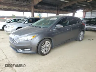 2015 Ford Focus Titanium with VIN 1FADP3N22FL357945, listed as a Copart auction lot 59979075 with 60,775 mi miles and Salvage title. Bid and sale history available at DreamBid. Image 1.