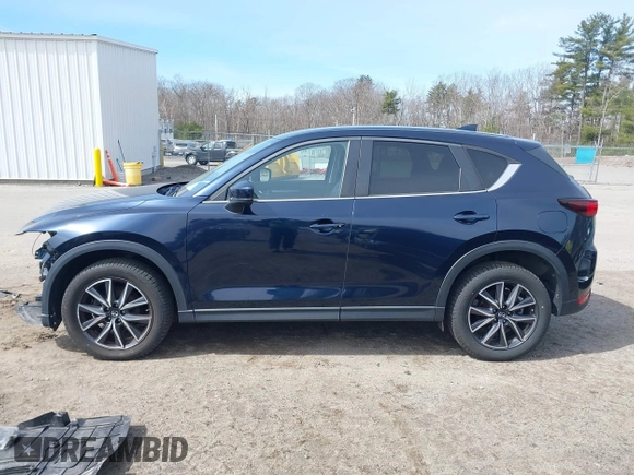 2018 Mazda CX-5 Touring z VIN JM3KFBCM4J0379871, wystawiony jako IAAI lot #41865130 z przebiegiem 48 674 mil mil oraz . Historia ofert i sprzedaży dostępna na DreamBid. Obrazek 15.