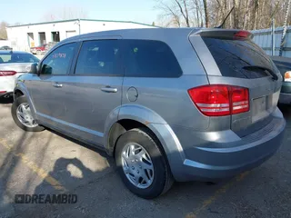 2015 Dodge Journey SE z VIN 3C4PDCAB7FT719679, wystawiony jako IAAI lot #41839838 z przebiegiem 119 610 mil mil oraz . Historia ofert i sprzedaży dostępna na DreamBid. Obrazek 3.