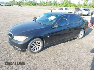 2007 BMW 3 Series 328xi with VIN WBAVC93597KX59671, listed as a IAAI auction lot 42542443 with 66,991 mi miles and . Bid and sale history available at DreamBid. Image 2.
