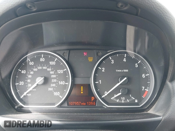 2012 BMW 1 Series 128i with VIN WBAUN1C52CVR00421, listed as a IAAI auction lot 41594256 with 107,957 mi miles and . Bid and sale history available at DreamBid. Image 7.