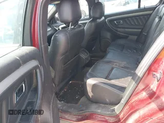 2014 Ford Taurus SEL z VIN 1FAHP2E82EG157445, wystawiony jako IAAI lot #42133676 z przebiegiem 174 616 mil mil oraz . Historia ofert i sprzedaży dostępna na DreamBid. Obrazek 8.