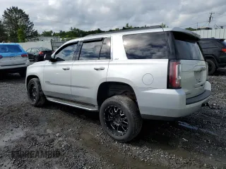 2015 GMC Yukon SLT with VIN 1GKS2BKC9FR518381, listed as a Copart auction lot 66352864 with 103,419 mi miles and Salvage Title. Bid and sale history available at carsss.com. Image 2.