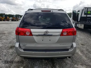 2010 Toyota Sienna XLE with VIN 5TDYK4CC5AS340124, listed as a Copart auction lot 66178854 with 99,485 mi miles and Salvage Title. Bid and sale history available at carsss.com. Image 6.