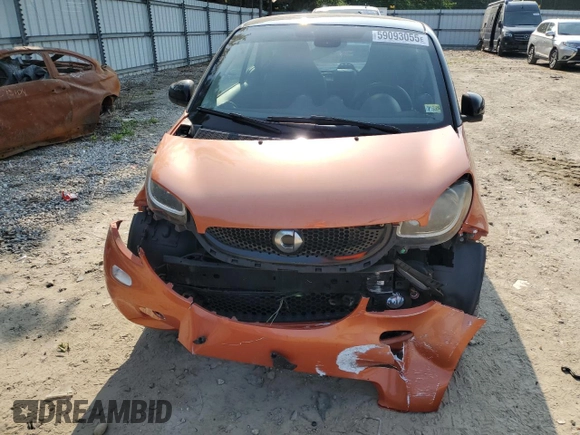 2016 Smart fortwo Passion с VIN WMEFJ5DA7GK066701, выставлен на аукционе Copart как лот 59093055 с пробегом 84 417 миль миль и Списание • Salvage title. История ставок и продаж доступна на DreamBid. Изображение 5.