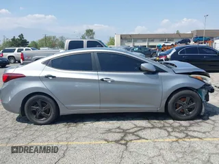 2014 Hyundai Elantra SE z VIN KMHDH4AE5EU118200, wystawiony jako IAAI lot #42178781 z przebiegiem 90 933 mil mil oraz . Historia ofert i sprzedaży dostępna na DreamBid. Obrazek 14.