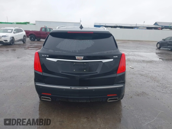 2017 Cadillac XT5 FWD with VIN 1GYKNARS0HZ317508, listed as a IAAI auction lot 40818768 with 132,598 mi miles. Bid and sale history available at carsss.com. Image 16.
