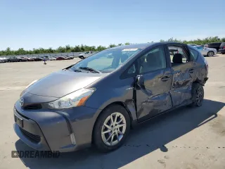 2015 Toyota Prius Two z VIN JTDZN3EU7FJ028628, wystawiony jako Copart lot #56996755 z przebiegiem 129 996 mil mil oraz Szkoda całkowita • Salvage title. Historia ofert i sprzedaży dostępna na DreamBid. Obrazek 1.