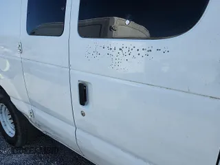 2011 Ford Econoline Cargo Commercial with VIN 1FTNE2ELXBDA76553, listed as a IAAI auction lot 42209249 with 167,041 mi miles. Bid and sale history available at carsss.com. Image 1.