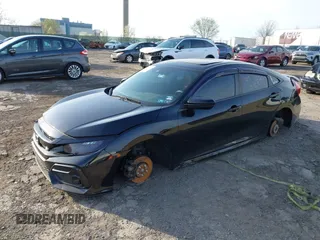 2020 Honda Civic Si z VIN 2HGFC1E57LH700157, wystawiony jako IAAI lot #41935665 z przebiegiem Nie podano mil oraz . Historia ofert i sprzedaży dostępna na DreamBid. Obrazek 21.