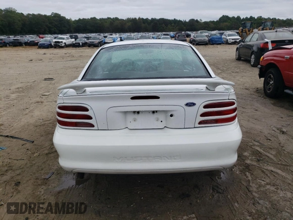 1995 Ford Mustang with VIN 1FALP4045SF181301, listed as a Copart auction lot 72989824 with 242,669 mi miles and Salvage Title. Bid and sale history available at carsss.com. Image 6.