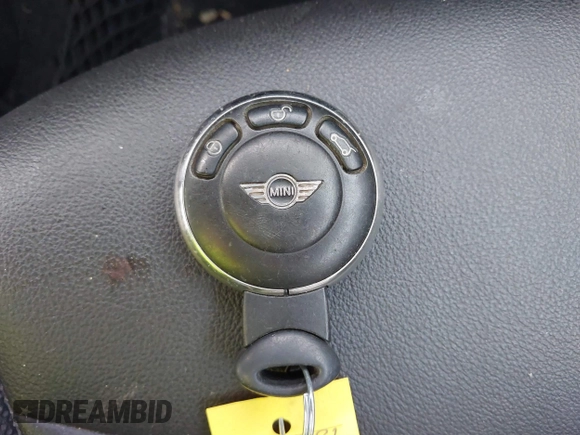 2012 MINI Hardtop with VIN WMWSU3C55CT257760, listed as a IAAI auction lot 40817805 with 63,973 mi miles and . Bid and sale history available at DreamBid. Image 11.