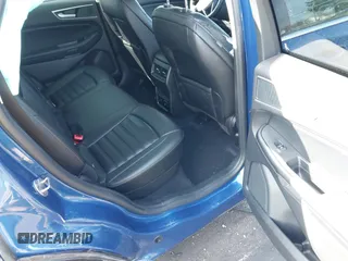 2024 Ford Edge SEL z VIN 2FMPK4J96RBA12822, wystawiony jako IAAI lot #41940628 z przebiegiem 8 981 mil mil oraz . Historia ofert i sprzedaży dostępna na DreamBid. Obrazek 8.